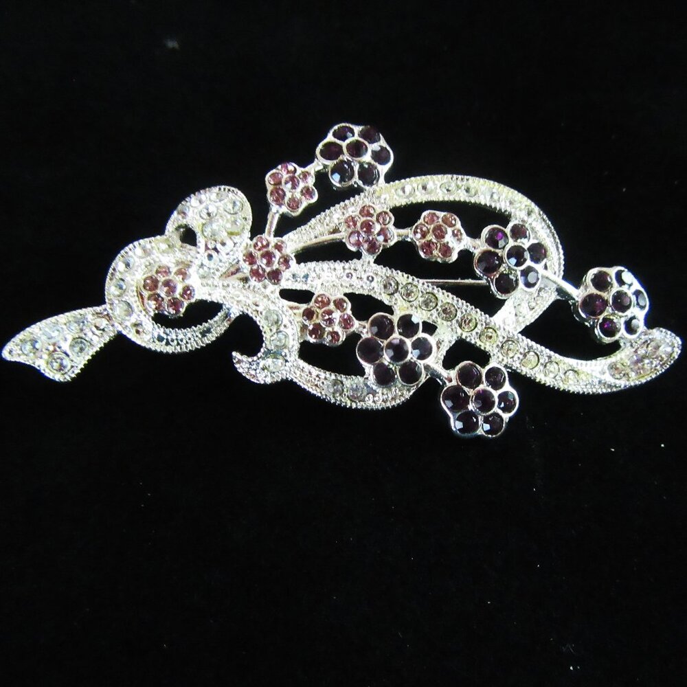 Vintage Napier silver floral brooch with light & dark purple & clear rhinestones